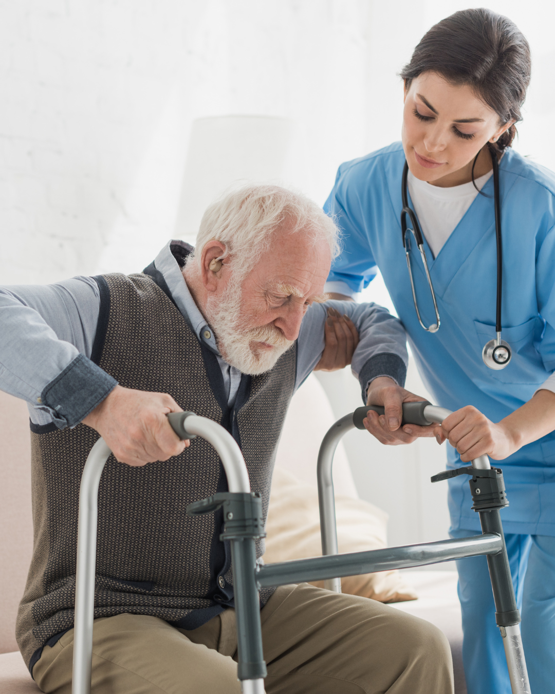 Elderly man smiling with caregiver